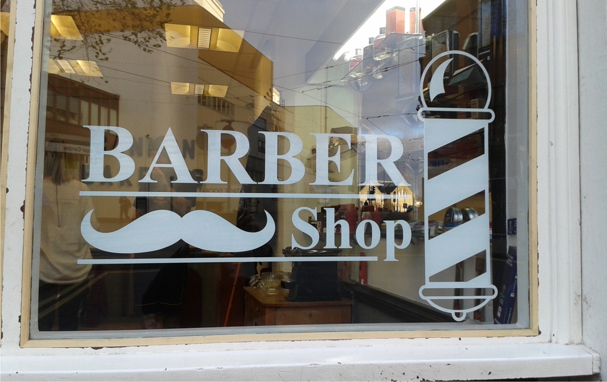 White window graphics for Cannon Barbers by M Signs